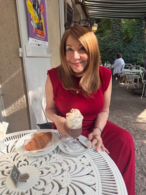 Debra at a cute Paris cafe