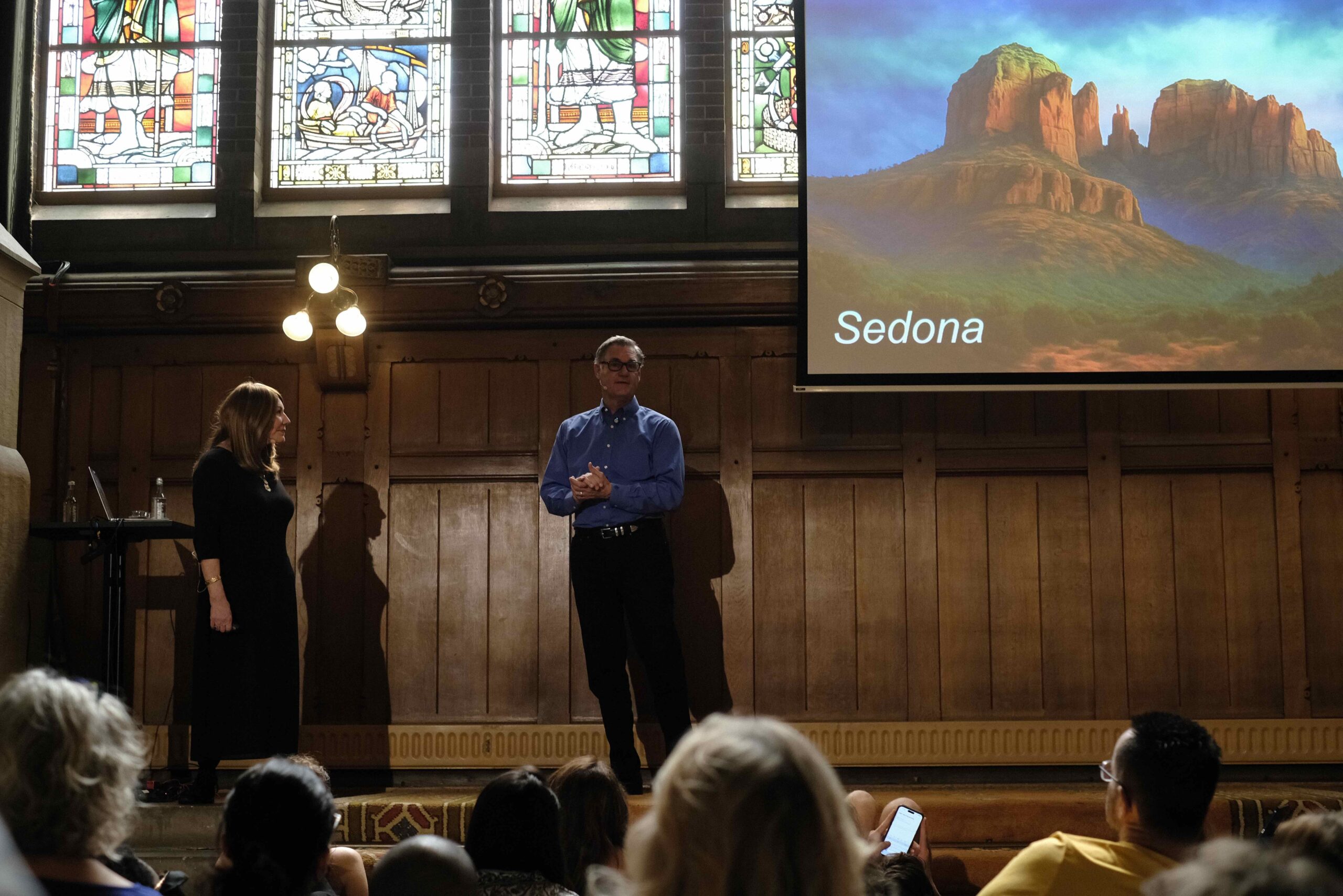 Debra & Richard on stage at Mindvalley