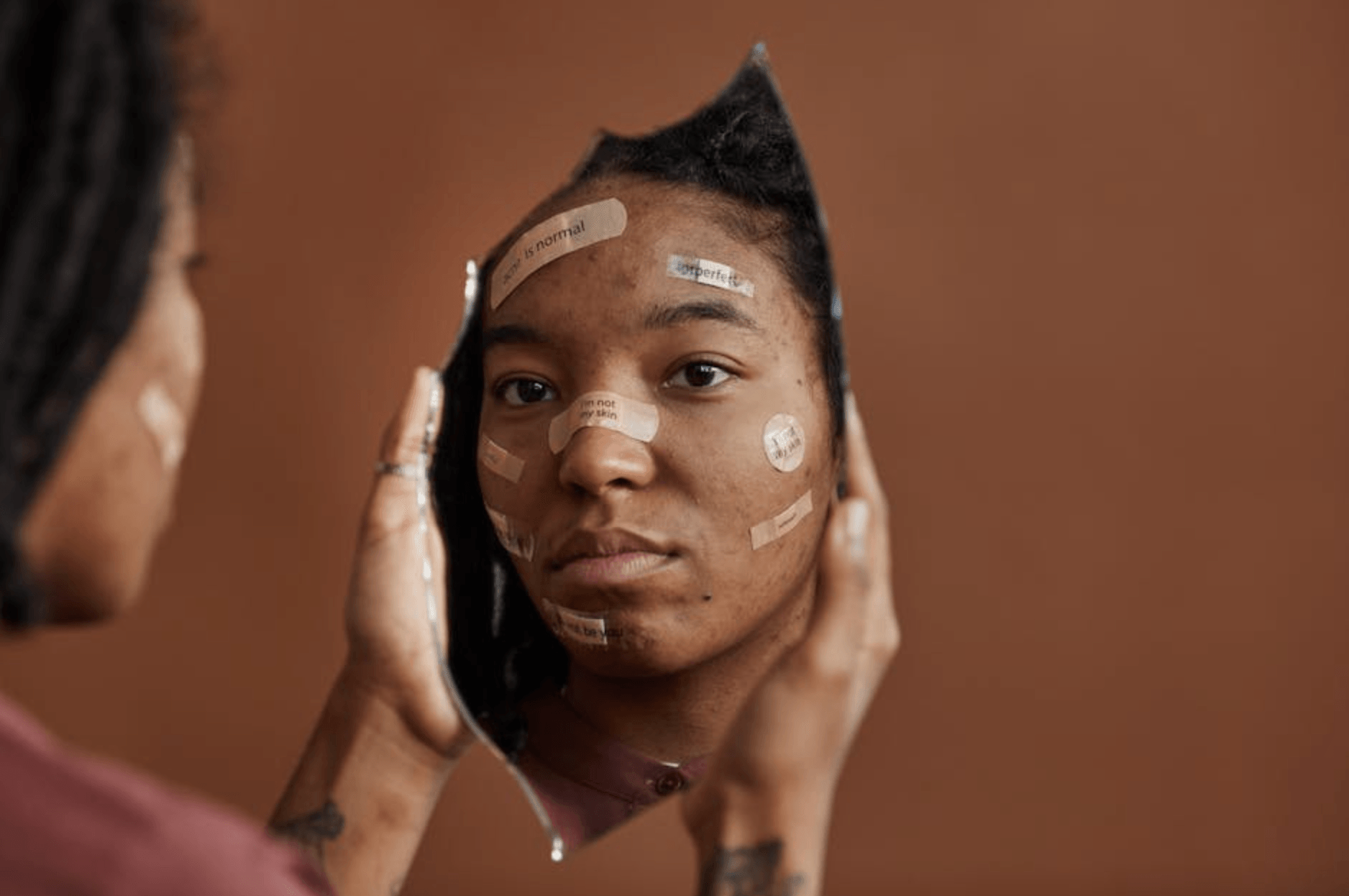 Woman looking at her flaws and insecurities