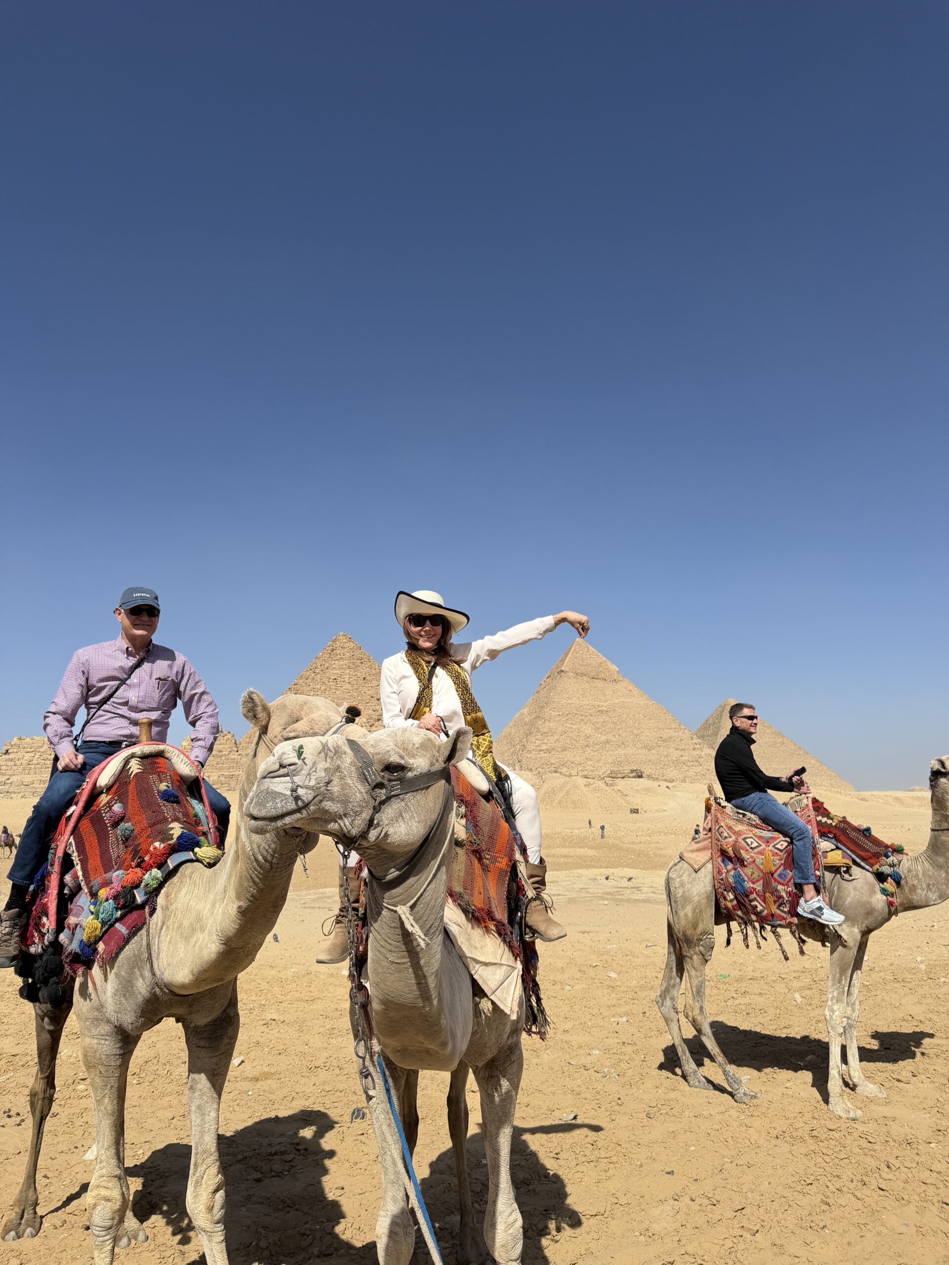 Debra & Richard on Camels in Egypt 2026 Debra & Richard on Camels in front of the pyramids in Egypt